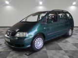 a picture of a green van parked in a garage