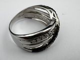 a close up of a ring on a white surface