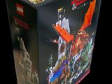the box is open to show the contents of a lego set