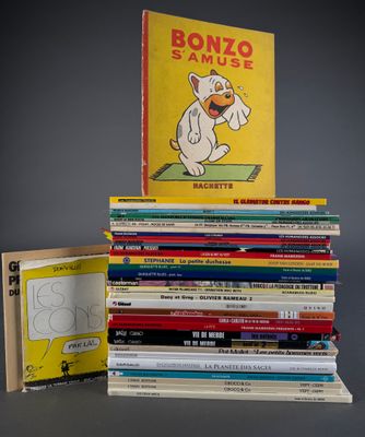 many books stacked on top of each other on a table