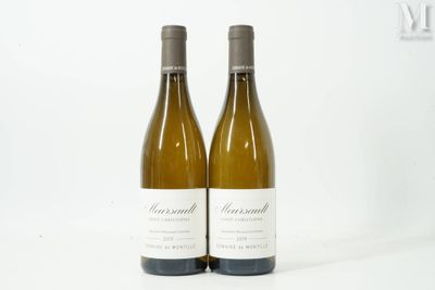 two bottles of white wine sitting next to each other on a white surface