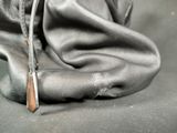 a pair of scissors that are laying on a cloth