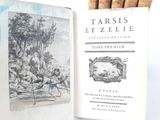 a book with a picture of a man and a woman playing a game of tennis