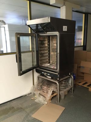an image of a commercial oven in the middle of a room