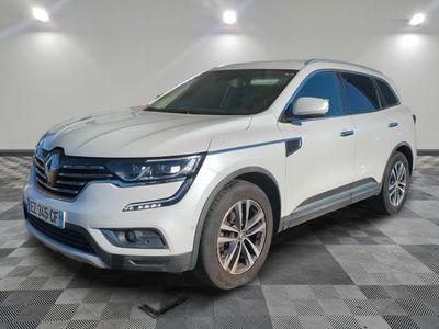 a white suv parked in a room with a checkered floor