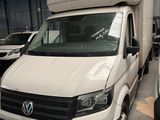 a white van that is parked in a garage