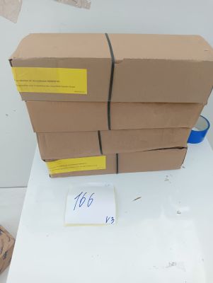 several cardboard boxes stacked on top of each other on a table