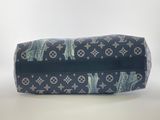 a close up of a louis vuitton bag on a white background