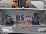 a machine that is sitting on the side of the road