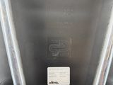 an image of a close up of a metal object with a label on it