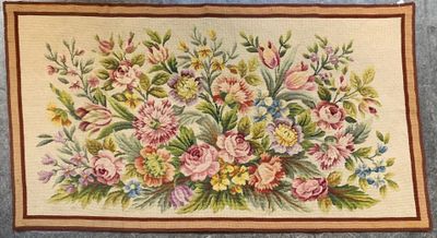 an image of a painting of a bouquet of flowers on a wall