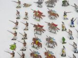 a lot of figurines that are on a table
