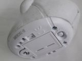 a close up of a white object on a white surface
