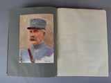 an open book with a picture of a man in a military uniform