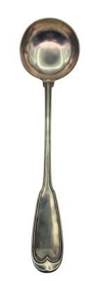 a spoon that is sitting on top of a spoon