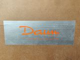 a brown box with a silver and orange logo on it