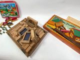 two wooden toys that are sitting on a table