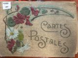 une inscription « cartes postales » sur le côté d'un sac