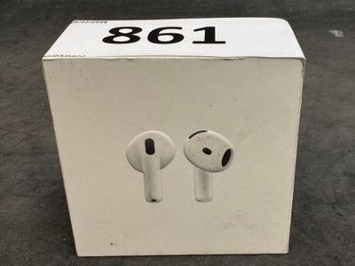 an apple airpods are sitting in a box on the floor