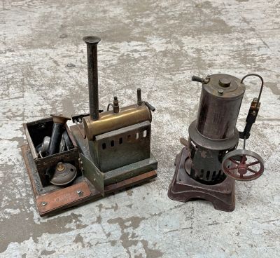 a small machine that is sitting next to a smaller machine
