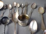 many spoons and spoons that are on a table