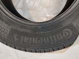 a tire that has been wrapped in plastic on the ground