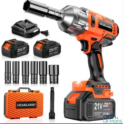a cordless drill with two batteries and a charger