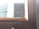a picture of a bathroom with a sink and a mirror