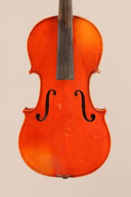 an orange violin with a black bow on a white background