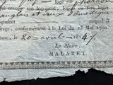 a piece of paper with writing on it on a black surface
