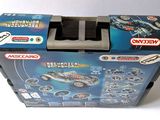 a toy car that is in a box on the table