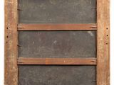 an old wooden window with three shelves on the side of it