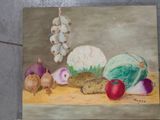two paintings of vegetables and bread on a table with a price tag