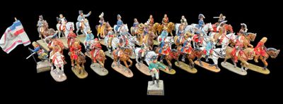 a lot of figurines that are on display together