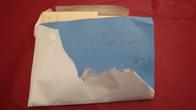 a piece of paper with a picture of a mountain on it