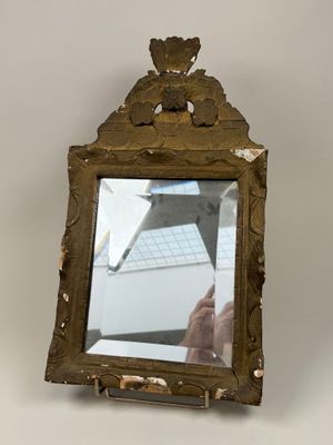 a mirror that is sitting on a table