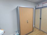 an image of a room with a closet and a desk