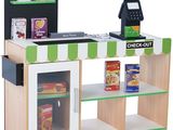 a wooden toy store with a checkout counter and shelves