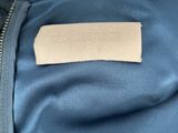 a close up of a piece of clothing with a label on it