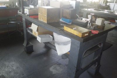 an image of a workbench with a lot of boxes on it