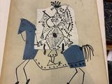 un dessin représentant un homme à cheval posé sur une table