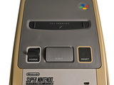 a close up of a nintendo super nintendo game console