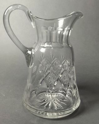 an image of a glass pitcher on a table