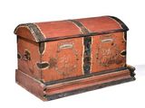 a wooden chest with a metal handle on a white background