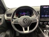 the interior of a car with a steering wheel, dashboard, and display screen