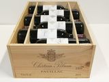 six bottles of wine in a wooden box