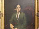 tableau représentant une femme en robe verte, assise sur une chaise