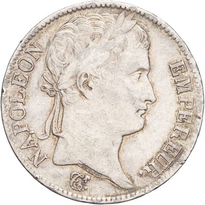 a close up of a coin with a woman ' s face on it