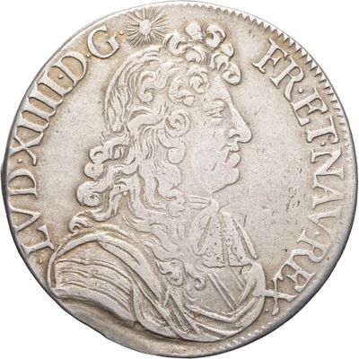 une pièce en argent avec l'image d'un homme de profil
