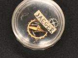a close up of a plastic container with a clock inside of it